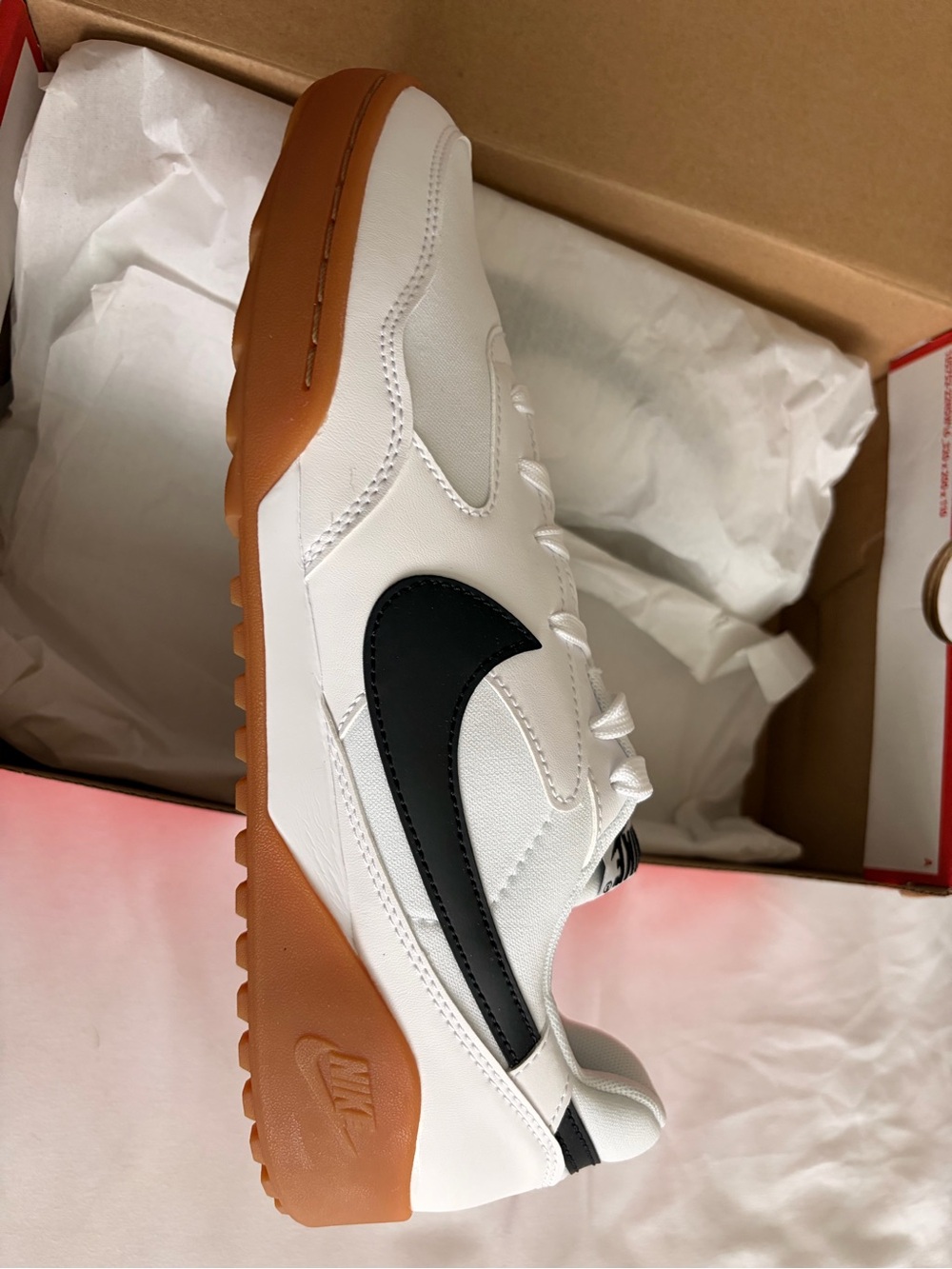 Nike White Sneakers with Black Swoosh and Gum Sole